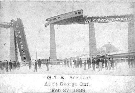 locomotive or locamotive wreck on bridge in 1900